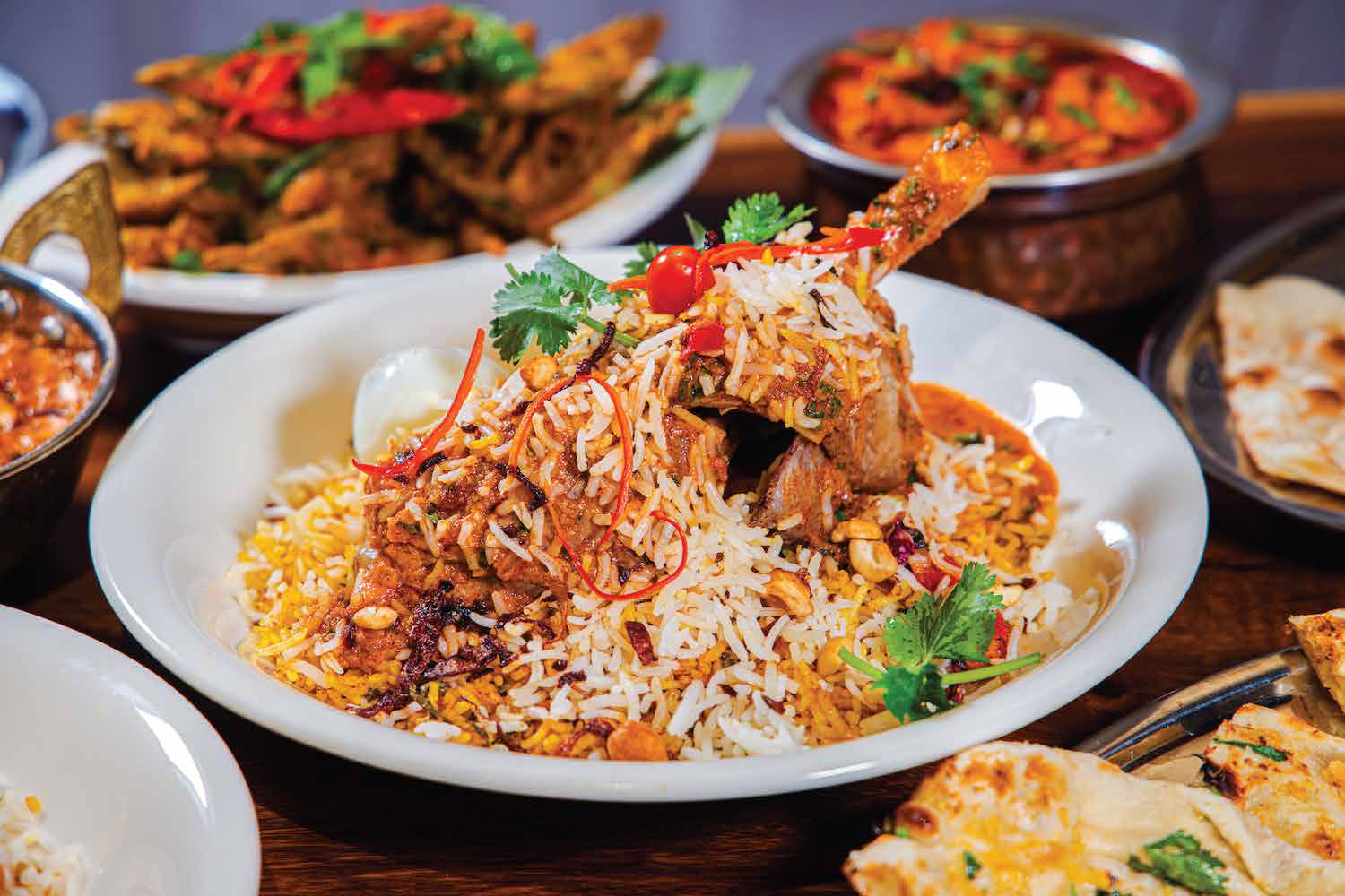 Cilantro biryani served at the table